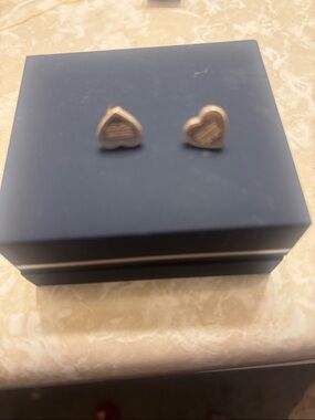 Small sterling silver heart shaped coach logo earrings